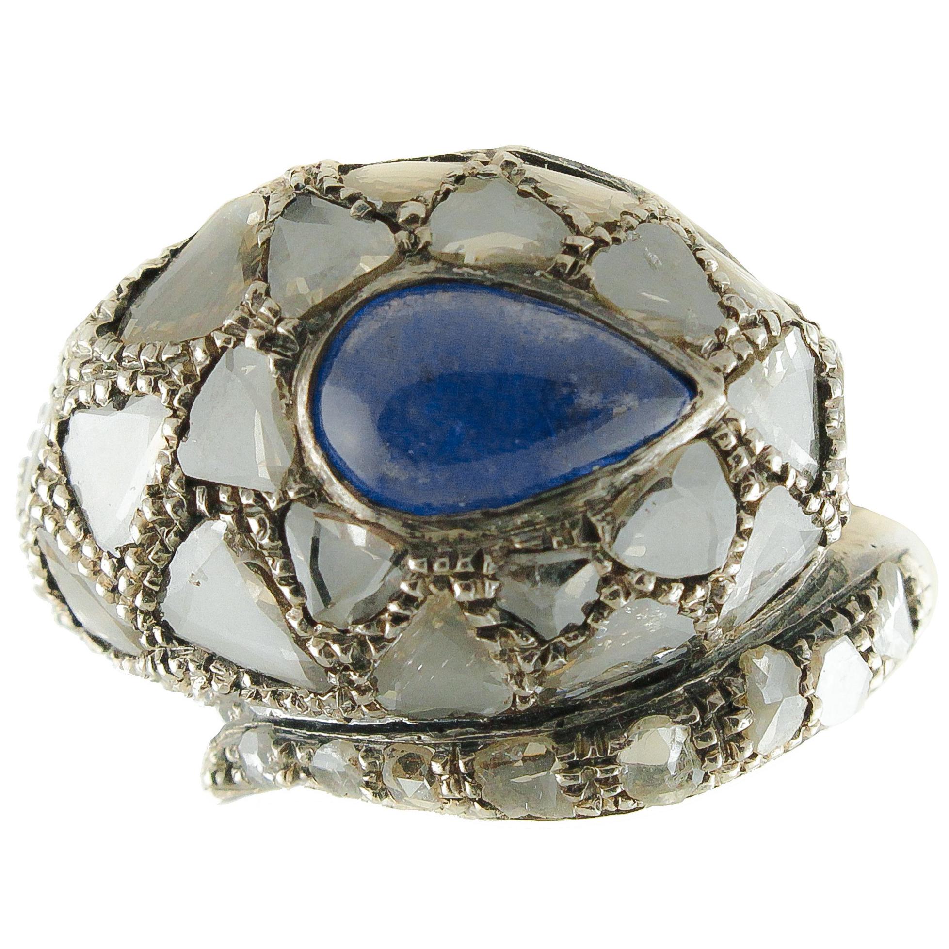 Bague fantaisie serpent en or rose et argent avec diamants et tanzanite