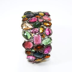 Diamonds and Tourmalines Clamper Bracelet Made of 18 Karat Gold and Silver