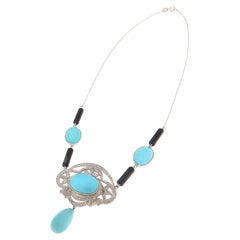 Collier pendentif en or blanc 18 carats, diamants, turquoises et onyx