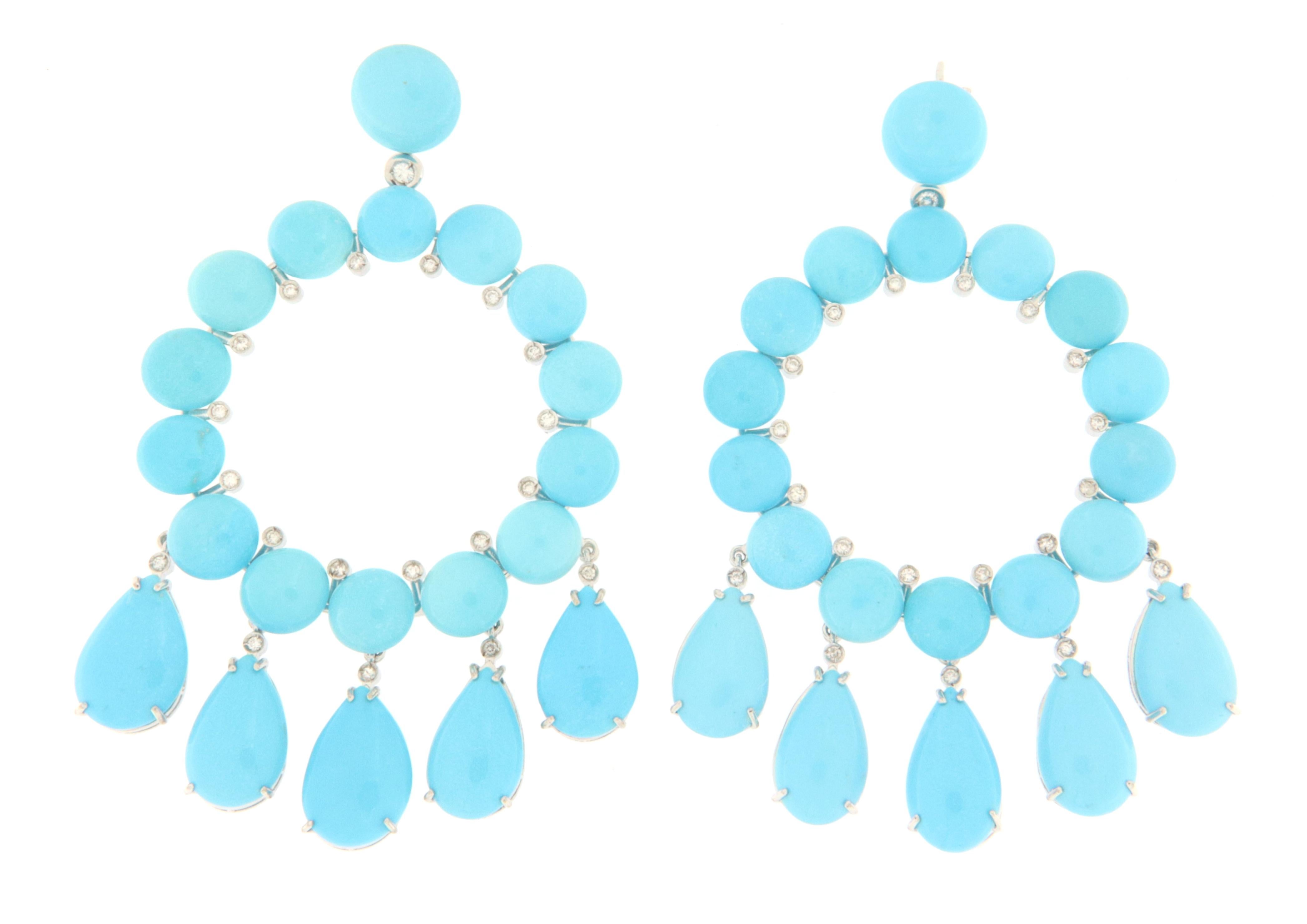 Fantastic earring made entirely by hand by expert master craftsmen. Made of 18 Karat white gold with natural diamonds and turquoise.
An earring to be exhibited on any occasion, simple but at the same time very impactful, in short, a jewel that a