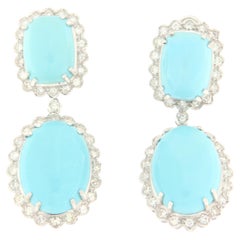 Boucles d'oreilles pendantes en or blanc 18 carats avec turquoise et diamants