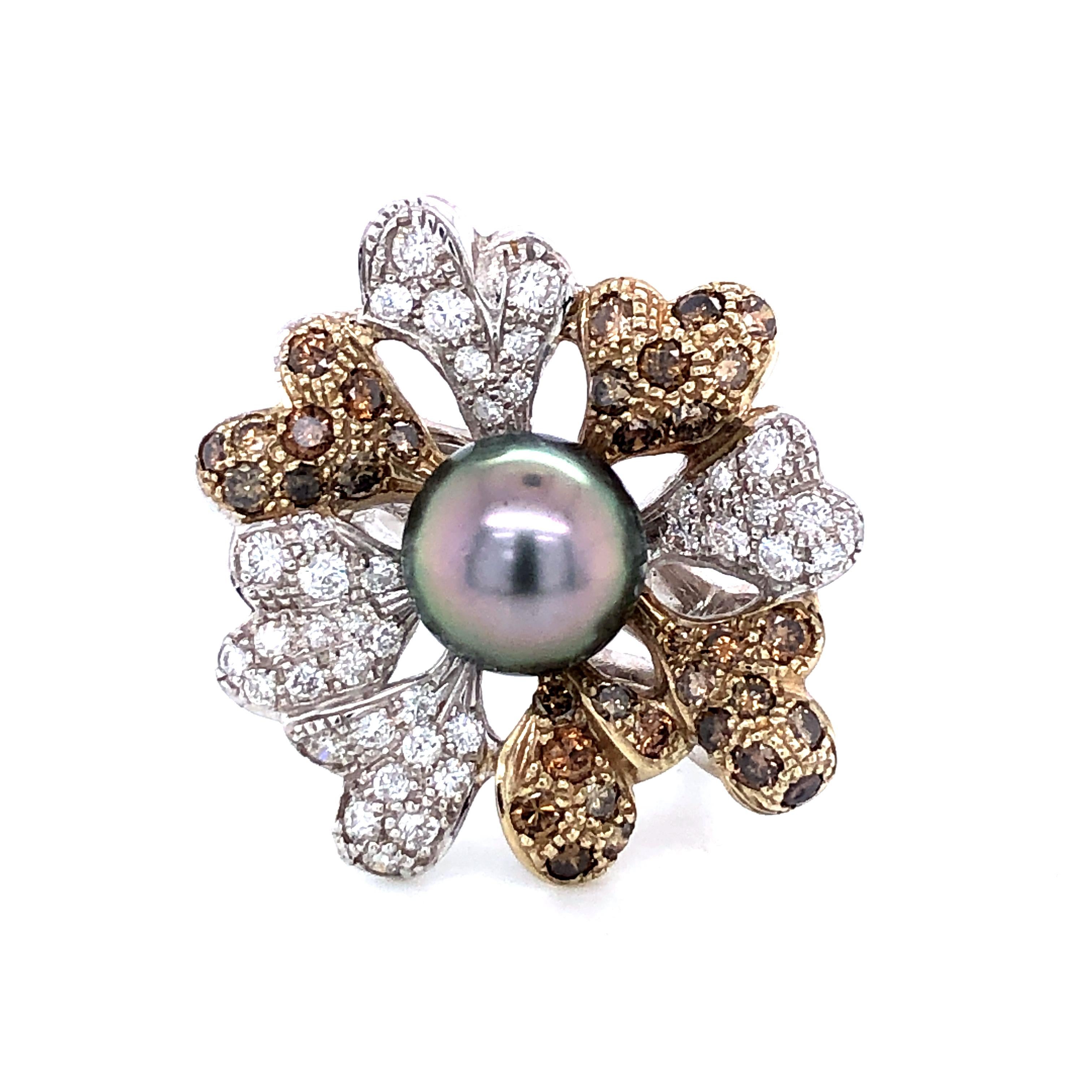 Tahiti Natural Pearl Diamonds White, brown on White Gold 18 k Flower Shape Ring
Brown and White Diamonds Brillant Cut: 2.4 ct
Size Of Natural Black Pearl of Tahiti: 9 / 9.5 mm
French Size: 53
US Sise: 6.5
British Size: M
Gold weight: 17.52 grams