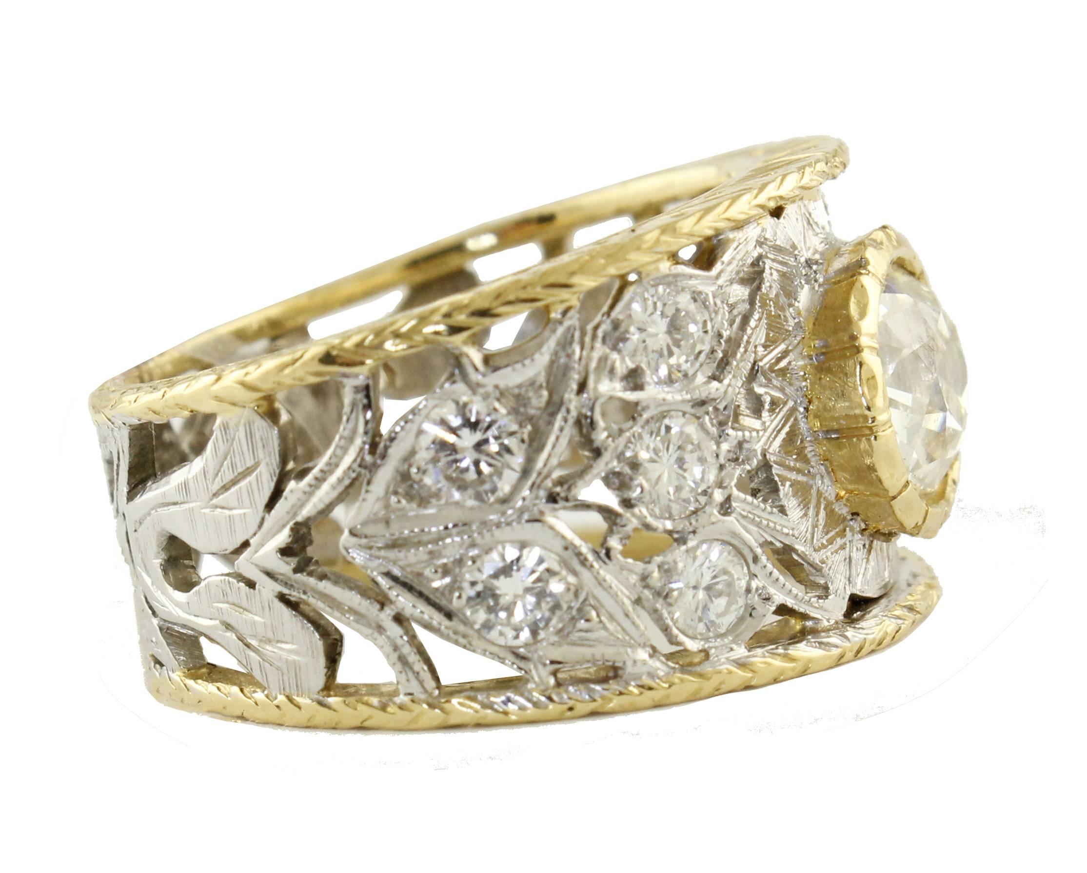 SHIPPING POLICY:
No additional costs will be added to this order.
Shipping costs will be totally covered by the seller (customs duties included).

Antique band ring in 18 kt white and yellow gold, filigree engraved and enriched with diamonds of ct