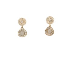 Boucles d'oreilles pendantes en or jaune 14 carats et diamants