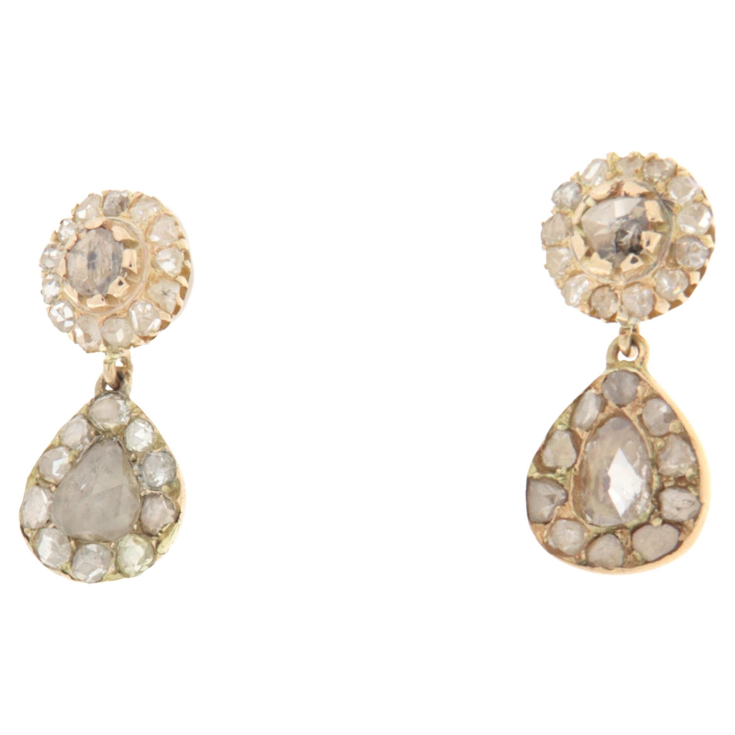 Boucles d'oreilles pendantes en or jaune 14 carats et diamants