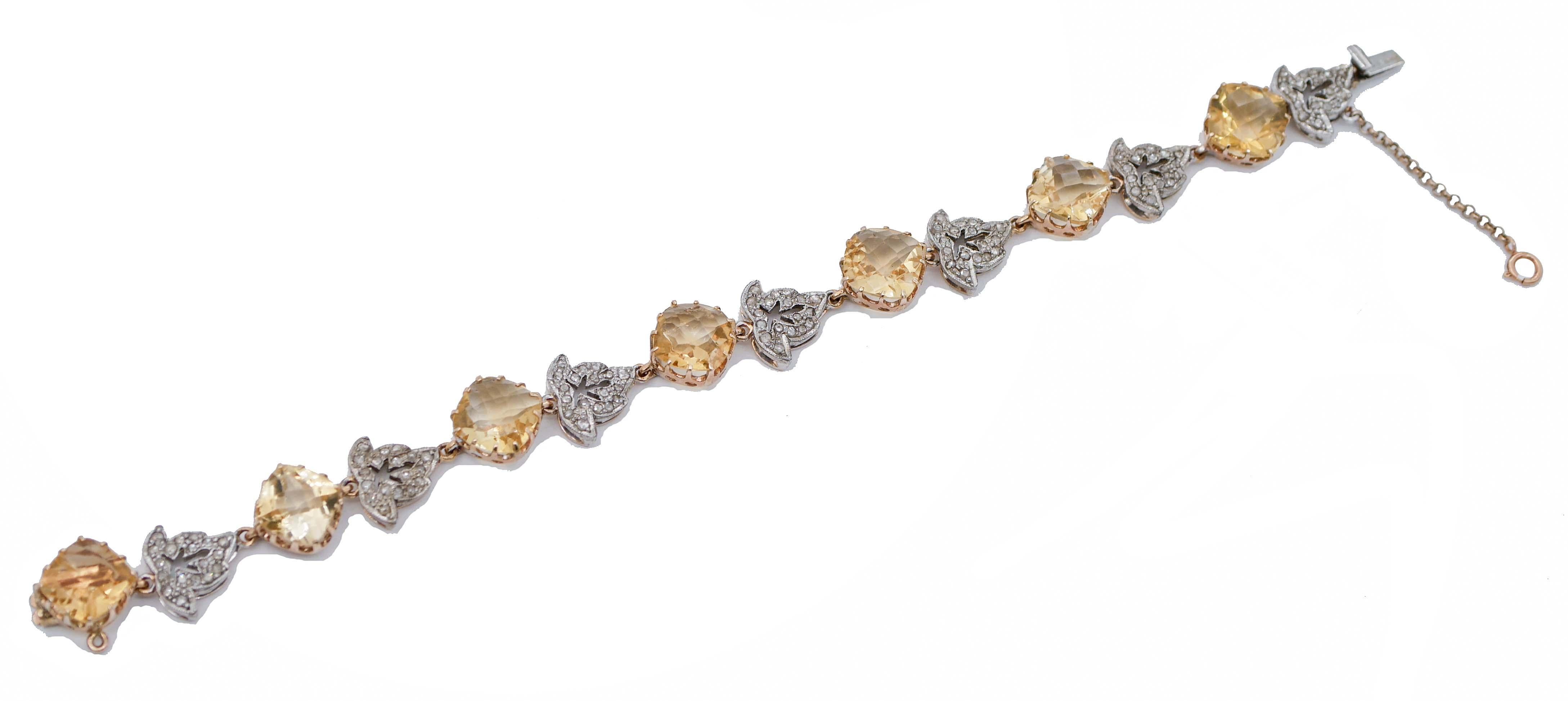 Wonderful retrò bracelet in 9 kt rose gold and silver structure, mounted with 7 yellow topaz sections which alternate with 7 rose gold and silver  leaves studded with diamonds.
This bracelet is totally handmade by Italian master goldsmiths and it is