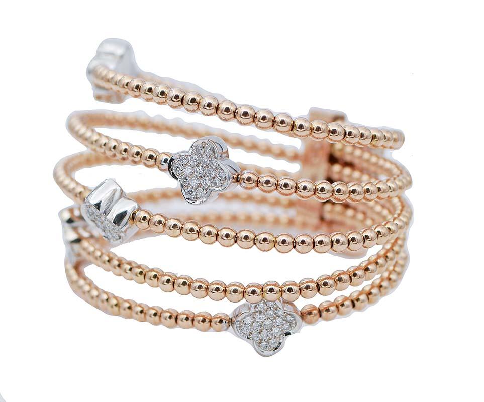 Incredibile bracciale moderno con struttura in oro rosa 18 carati montato con dettagli in oro bianco tempestati di diamanti.
Diamanti 1.10 ct
Peso totale 49.20 gr
RF  +GRGCC

Per qualsiasi richiesta, si prega di contattare il venditore attraverso il