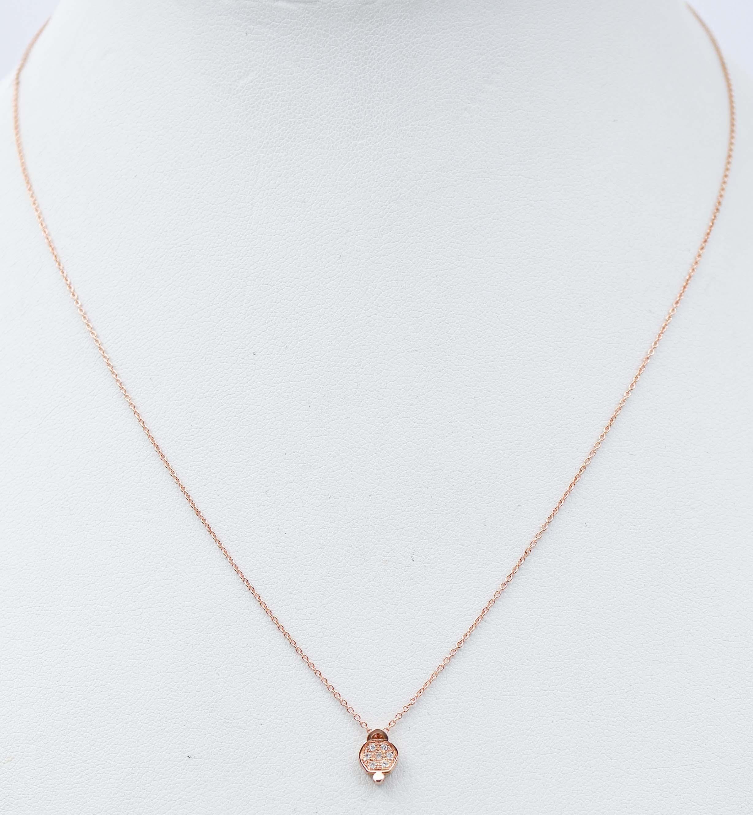 Amazing modern little bell pendant necklace in 18 kt rose gold structure mounted with diamonds.
Diamonds 0.04 ct
Total Weight 1.80 gr
RF  G     EAE
RK.GUF
Lenght Chain 44 cm
Lenght Pendant 8 mm
Width Pendant 6 mm

For any inquiries,please contact
