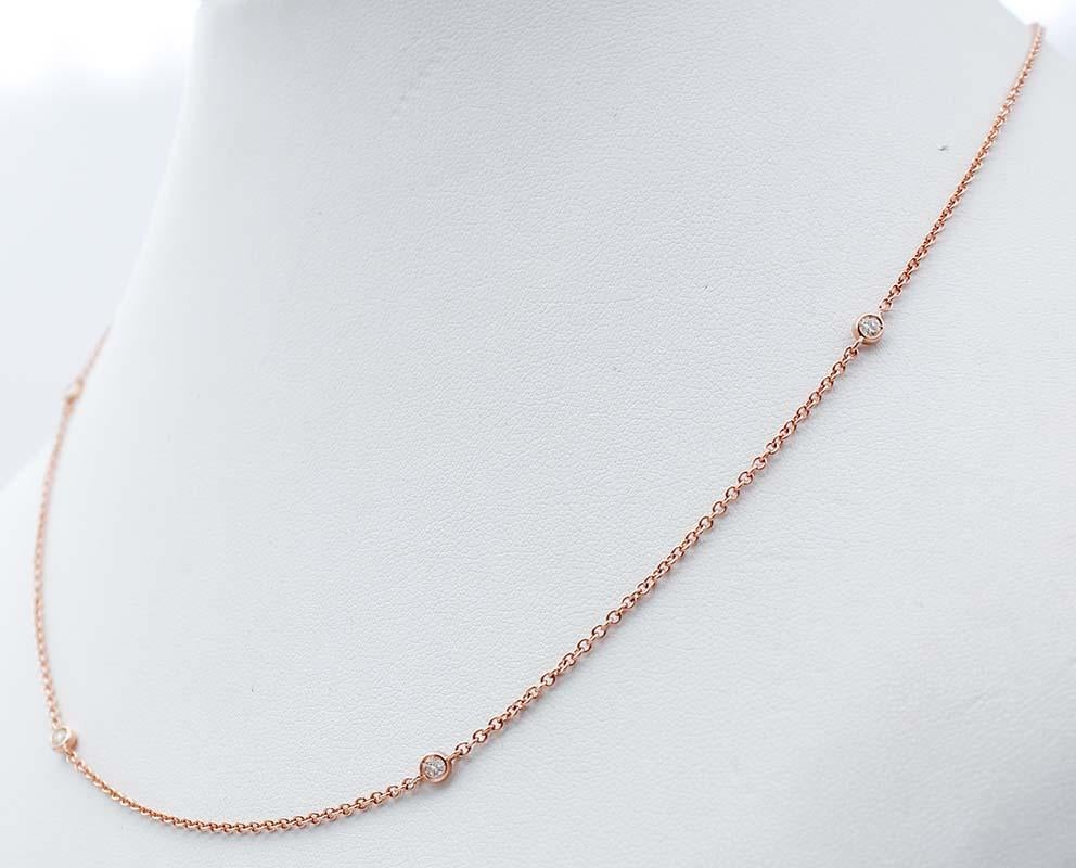 SHIPPING POLICY:
No additional costs will be added to this order.
Shipping costs will be totally covered by the seller (customs duties included). 

Simple and elegant at the same time modern necklace in 18 karat rose structure mounted with four