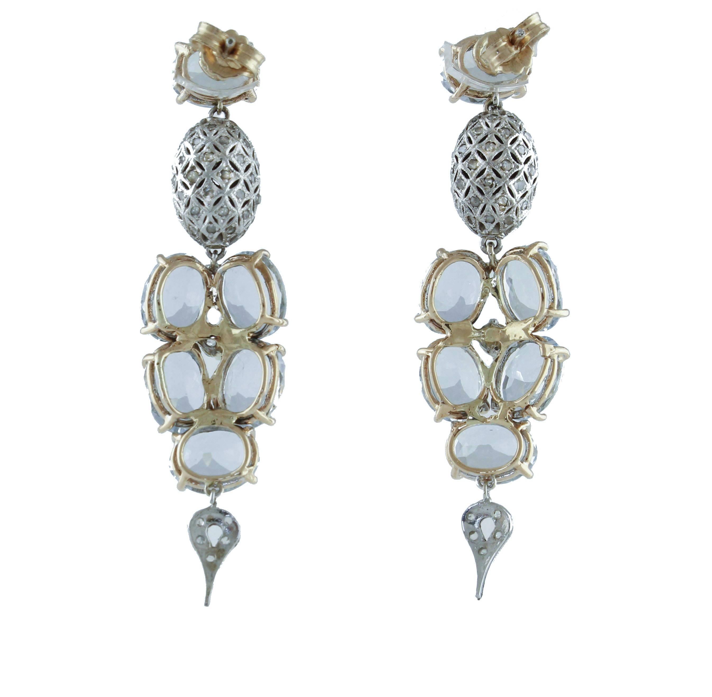Delightful and elegant drop earrings in kt14 white and pink gold, studded with diamonds of ct 0.86, and bright aquamarine stones from ct 12.58. Total weight g10.0

Diamonds ct 0.86
Aquamarine ct 12.58
Total weight g10.0
R.F + fgga
