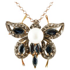 Diamonds,Blue Sapphires,Pearl, 14k Rose Gold and Silver Butterfly Pendant/Brooch