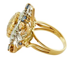 Bague cocktail en or rose et blanc 14 carats, diamants, saphirs bleus, tsavorites et topaze