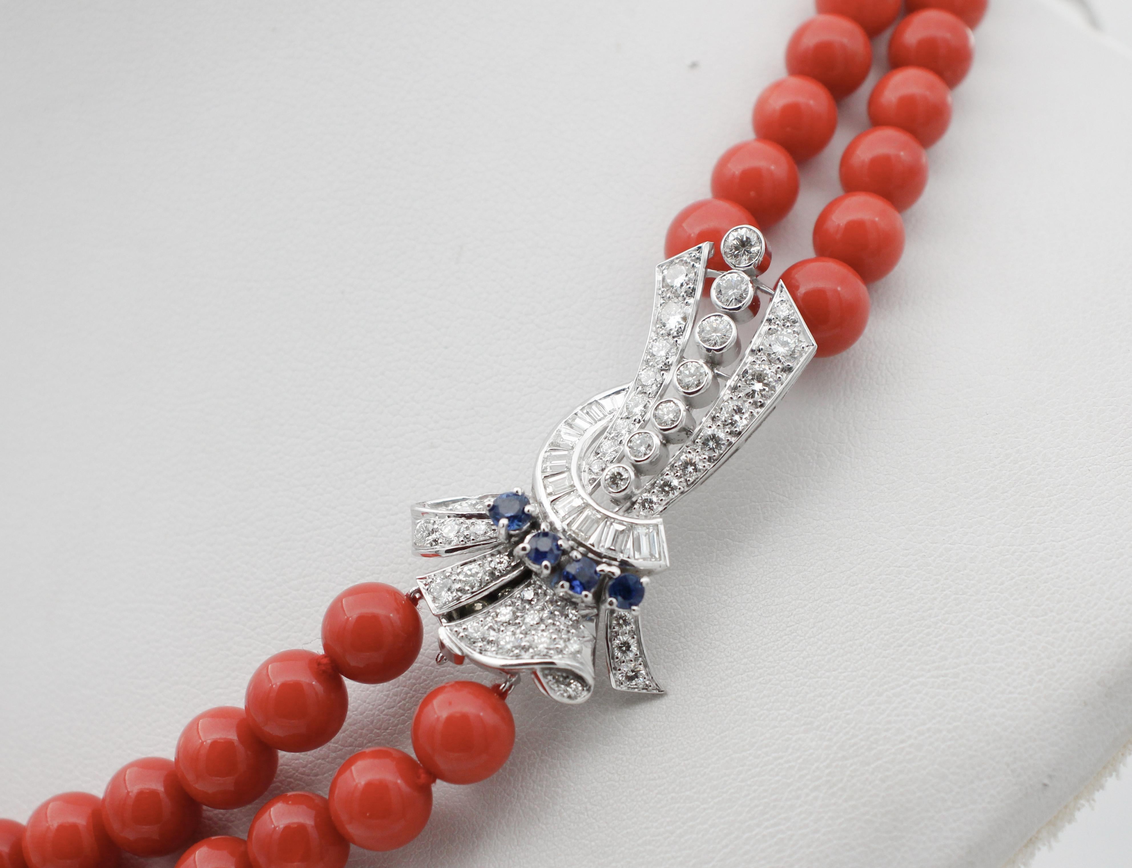 Elegant multi-strands necklace composed of two rows of coral spheres and a platinum closure studded with diamonds and blue sapphires.
This necklace is totally handmade by Italian master goldsmith and it is in perfect condition.
Diamonds 2.50