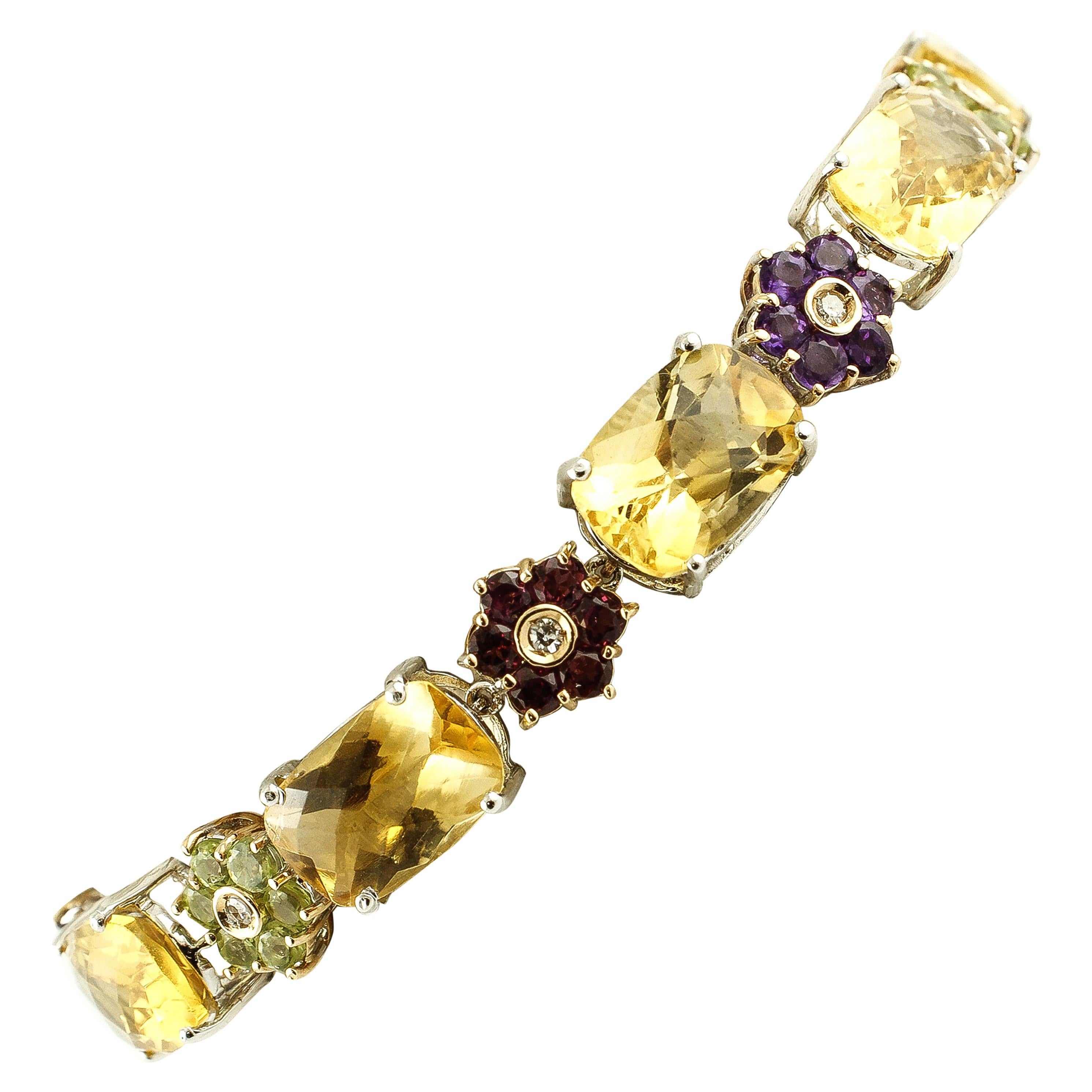 Bracelet en or 14 carats avec diamants, saphirs, topazes, améthystes, grenats et péridots