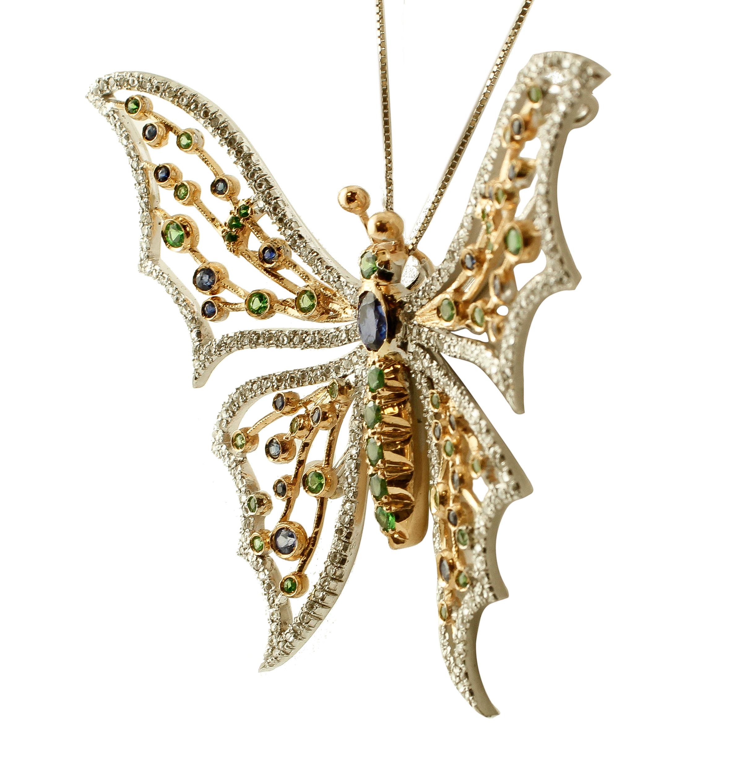 

Beautiful vintage butterfly brooch/pendant in 14 kt white and yellow gold totally studded with diamonds, blue sapphires and tsavorite (chain not included).
This brooch/pendant is totally handmade by Italian master goldsmiths.
Diamonds 1.23 ct,