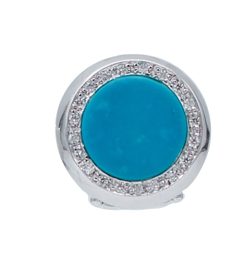 Simple and elegant stud earrings in 18 karat white gold structure mounted with a central stone surrounded by diamonds.
These earrings were totally handmade by Italian master goldsmiths and they are in perfect conditions.
Diamonds 0.20 ct
Stone 1.00