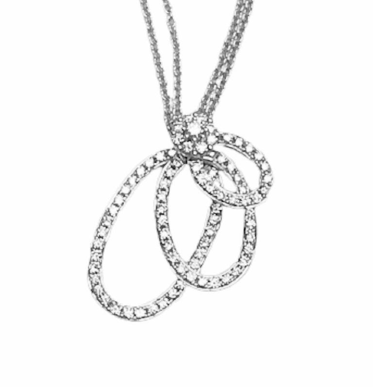 This beautiful pendant has three layered oval frames set with round diamonds, dangling from a round base bail. Each frame of diamonds has free side-to-side motion for a playful dangle on the neck. The total diamond weight is 0.80 carats.

The piece