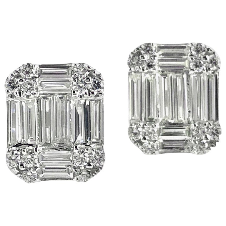 These diamond studs shine with carefully placed round and baguette diamonds, giving the impression of a larger facing stone. The total diamond weight is 1.12 carats, set in 18k White Gold. A suitable bridal accompaniment, or for the event of your