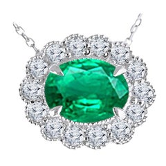 DiamondTown 1.37 Carat Oval Cut Emerald and 0.42 Ct Diamond Milgrain Flower