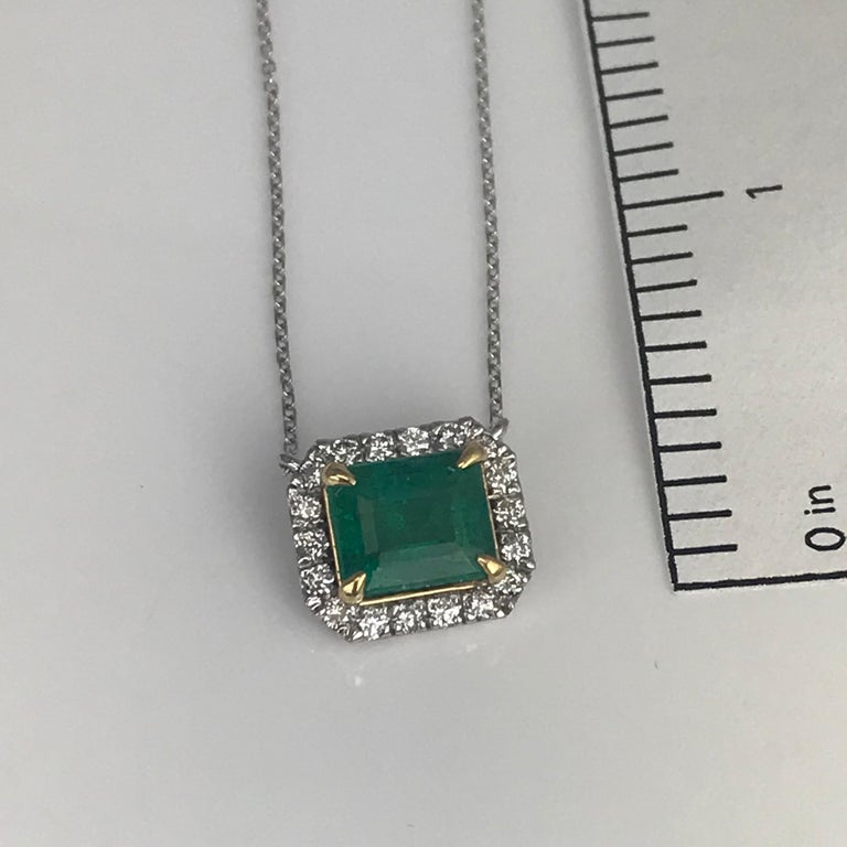 Women's Diamond Town 2.33 Carat Emerald Cut Emerald Pendant with 0.32 Carat Diamond Halo For Sale