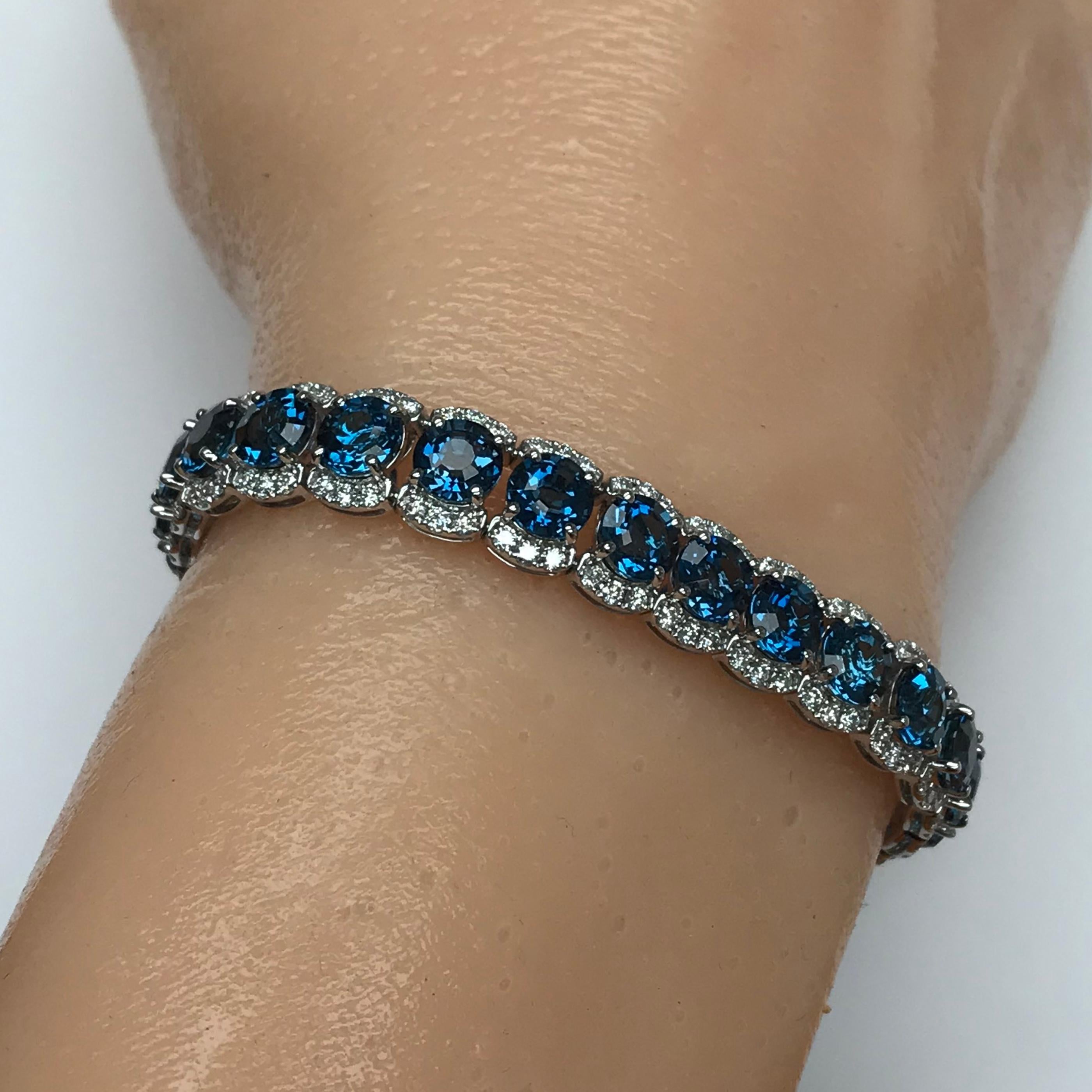DiamondTown 31.33 Carat Step Cut Blue Topaz and 3.1 Carat White Diamond Bracelet In New Condition In New York, NY