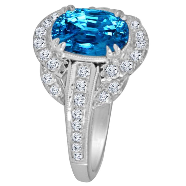 DiamondTown 3.34 Carat Oval Cut Blue Zircon and Diamond Halo Ring