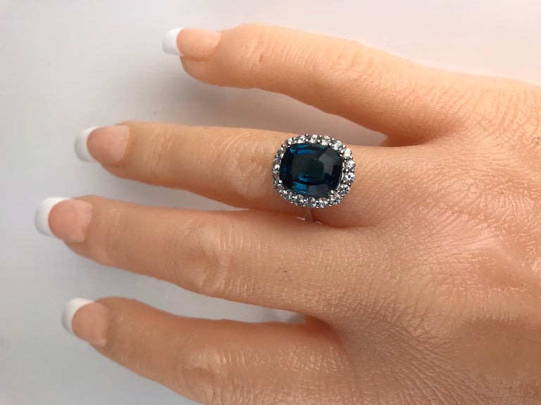 Contemporary DiamondTown 7.29 Carat London Blue Topaz Ring with White Sapphire Halo For Sale