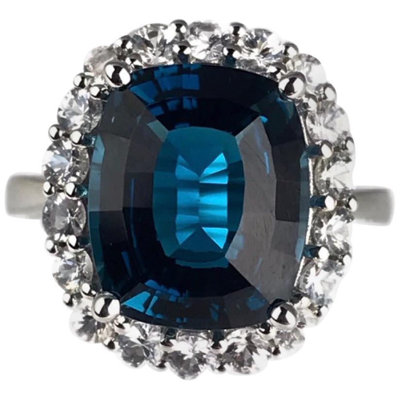 DiamondTown 7.29 Carat London Blue Topaz Ring with White Sapphire Halo
