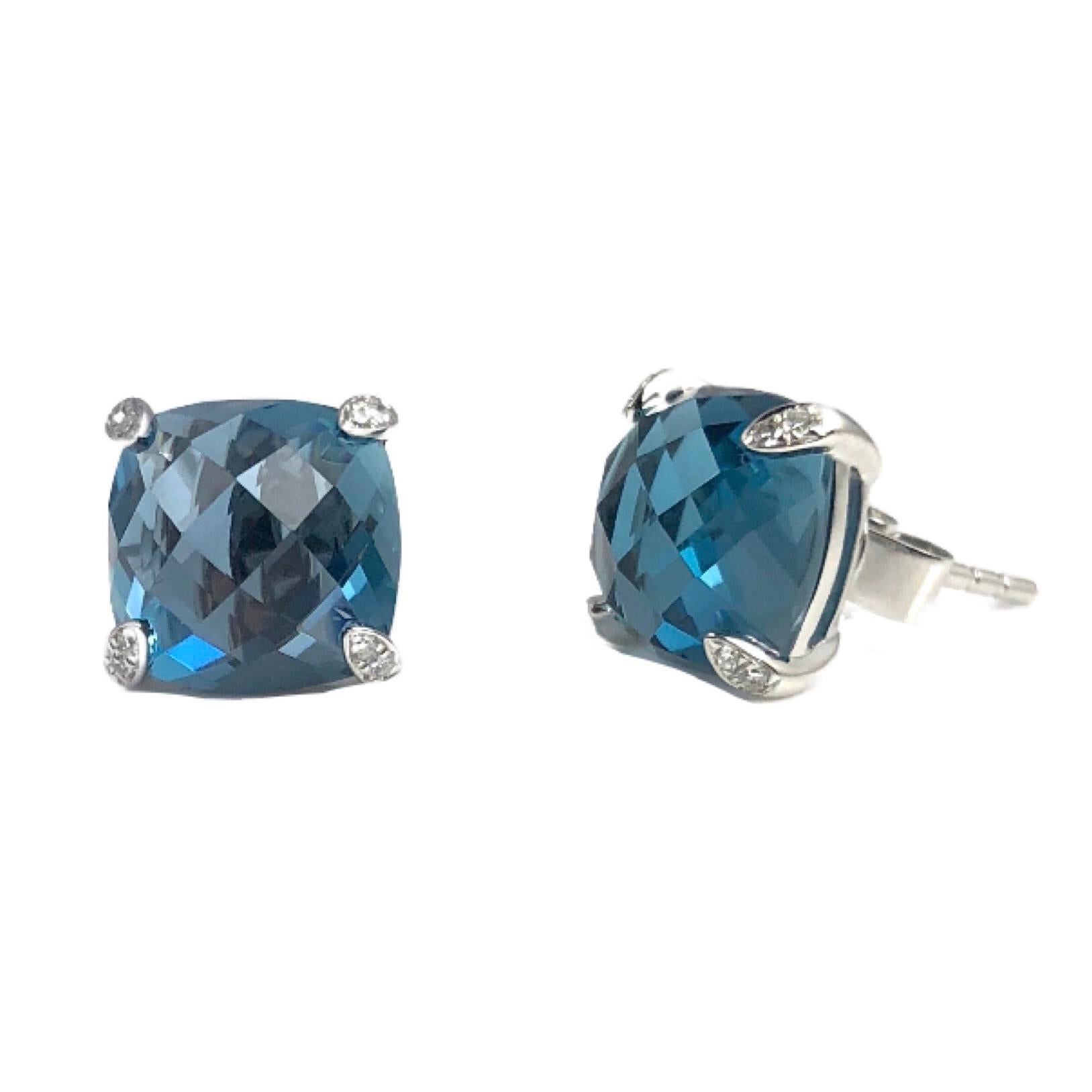 These beautiful earrings feature 7.92 carats cushion cut blue topaz. The prongs are embellished with 0.05 carats diamonds.

Set in 14k white gold, these earrings would be a welcome addition to any jewelry box.

Diamond Town is pleased to offer a