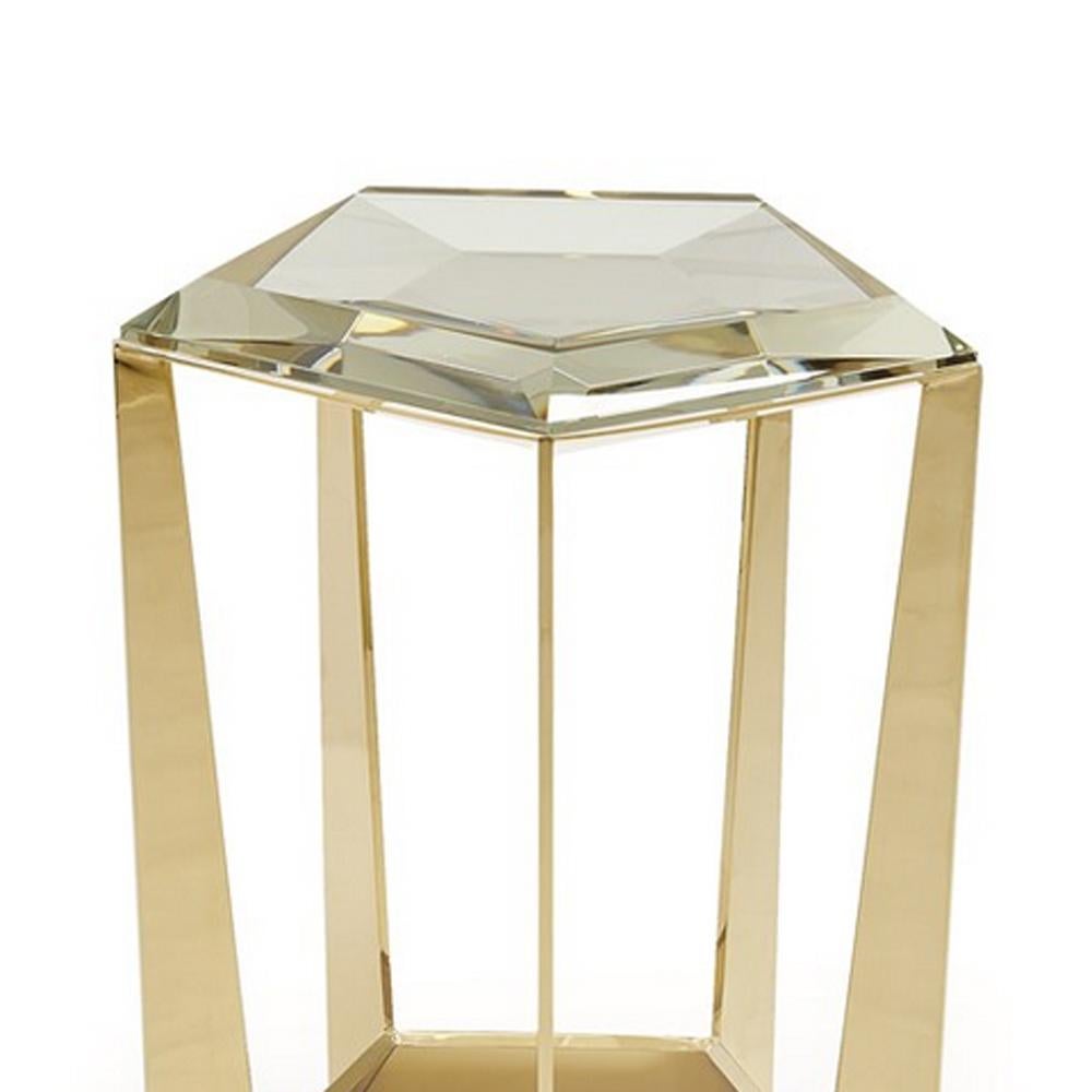 SIde table Diamony with structure in steel
in gold finish. With bevelled crystal glass top.