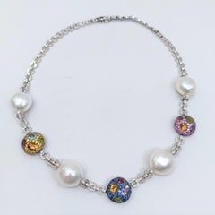 Diamrusa white gold necklace on a chain with diamonds.