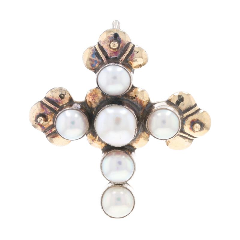 Brand: Dian Malouf

Metal Content: Sterling Silver & 14k Yellow Gold

Stone Information

Cultured Mabe Pearls
Color: White

Style: Convertible Brooch/Pendant Enhancer
Fastening Type: Hinged Pin and Whale Tail Clasp
Theme: Cross, Faith
Features: