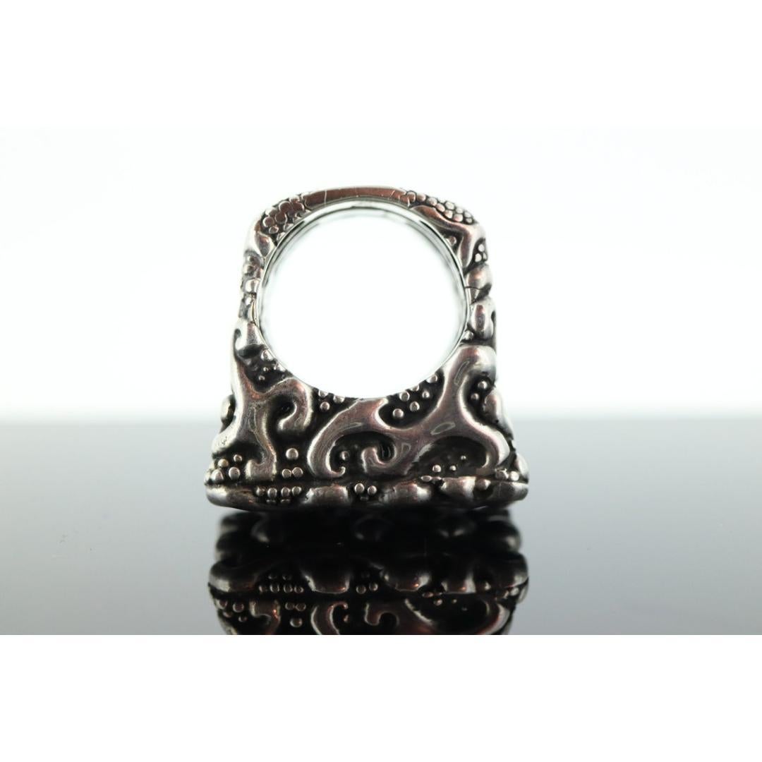 Vintage from before 2000
Size: 7.5
Materials: Gold, Silver, Stone

A RARE Modernist Piece by Dian Malouf

Three Slim Stacker Rings welded together to form a cluster.

Condition: Shows no visible wear.

Details:
34.3grams total weight

Will consider
