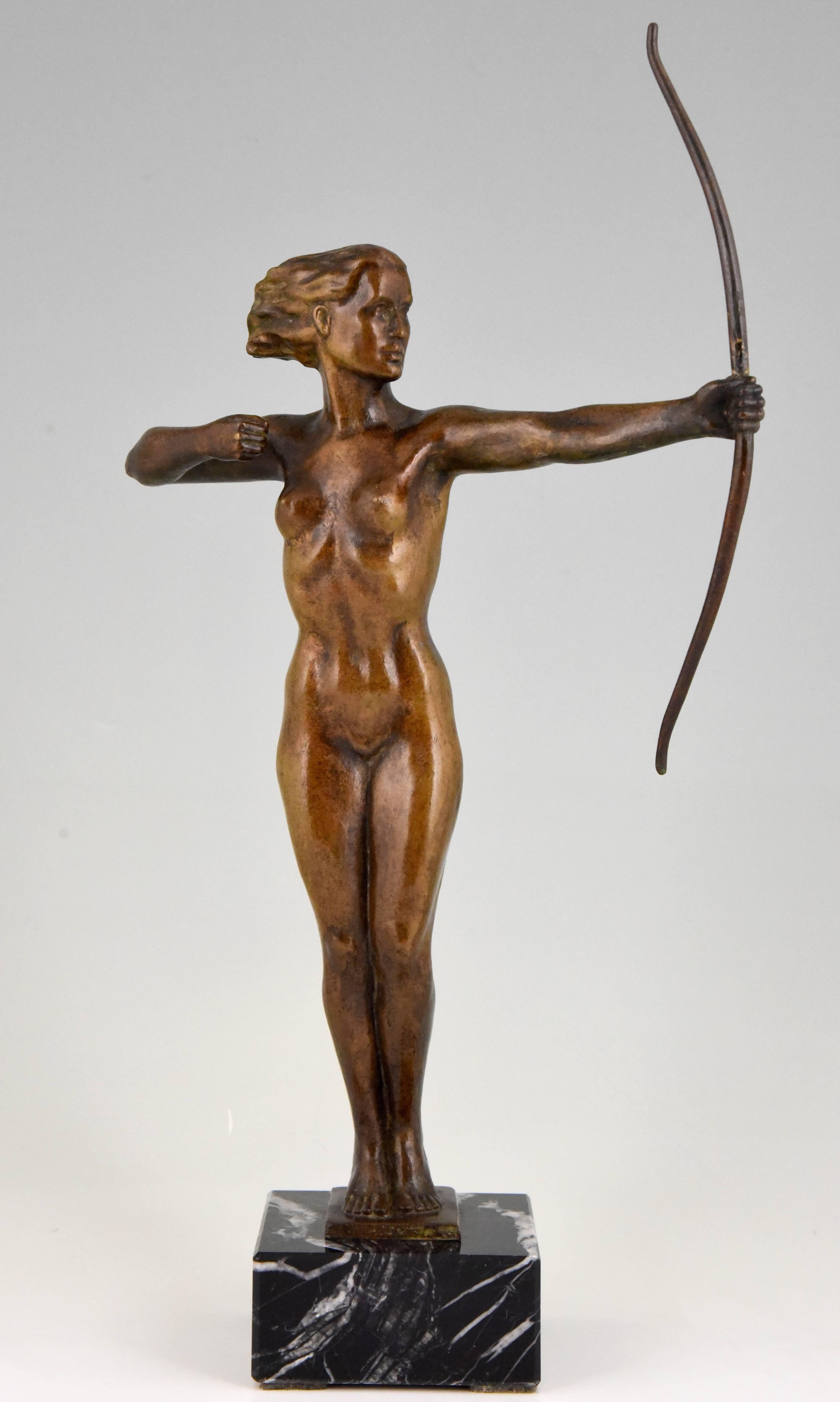 Very nice Art Deco bronze sculpture of a standing nude with bow. Monogram V. H. On marble base, circa 1930.
 