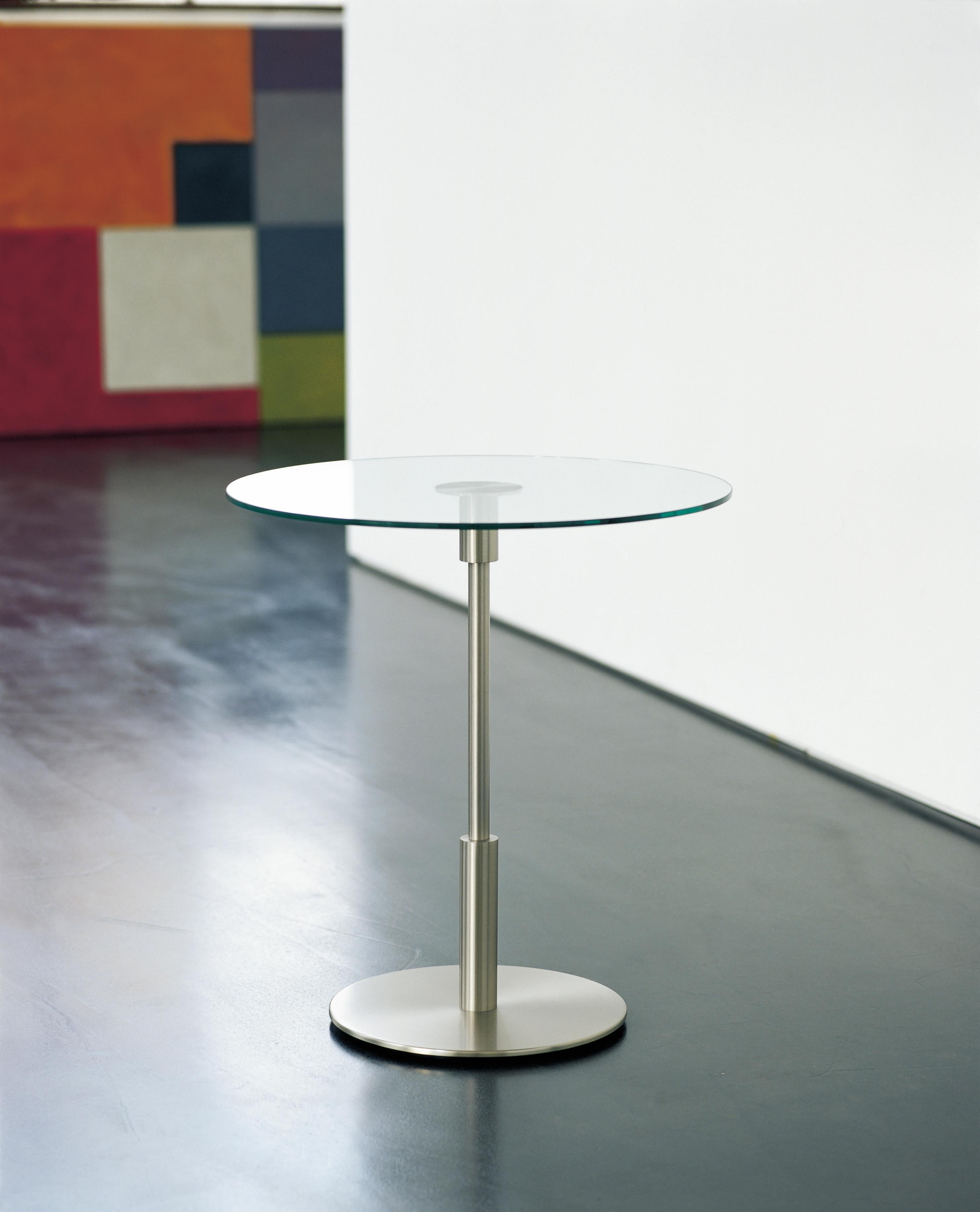 Diana baja side table by Federico Correa, Alfonso Milá, Miguel Milá.
Dimensions: D 70 x H 52 cm
Materials: Metal, tempered glass.
Available in 2 sizes: D 58 x H 62, D 70 x H 52 cm.

The Diana table is the embodiment of eloquent timelessness.