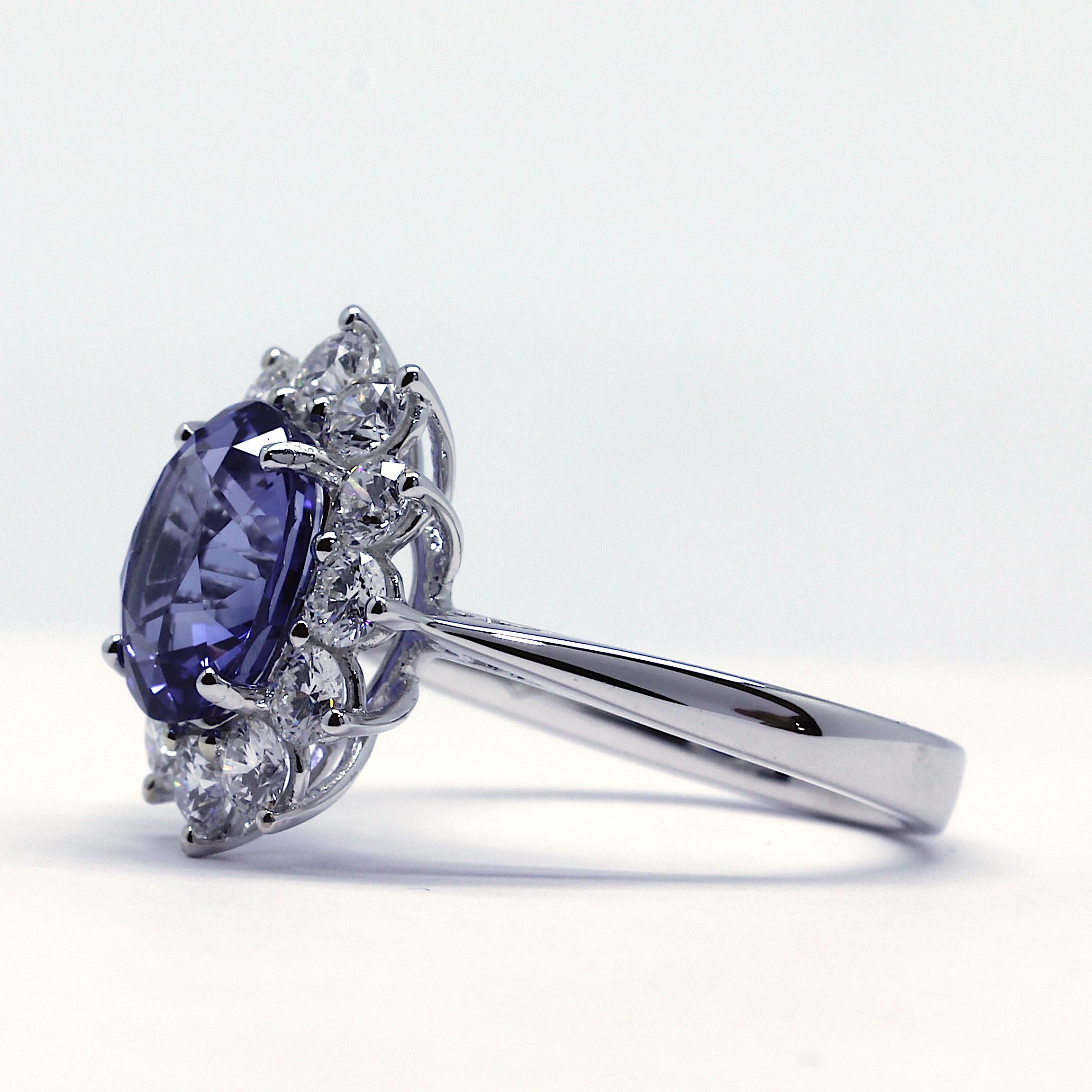 We all remember the beautiful Sapphire ring Princess Diana wore. Now you can wear one yourself. This exquisite piece was made in 18 Karat white gold. In the center a 3.34 Carat Sapphire enveloped by 1.10 Carat clear, sparkling white diamonds. This