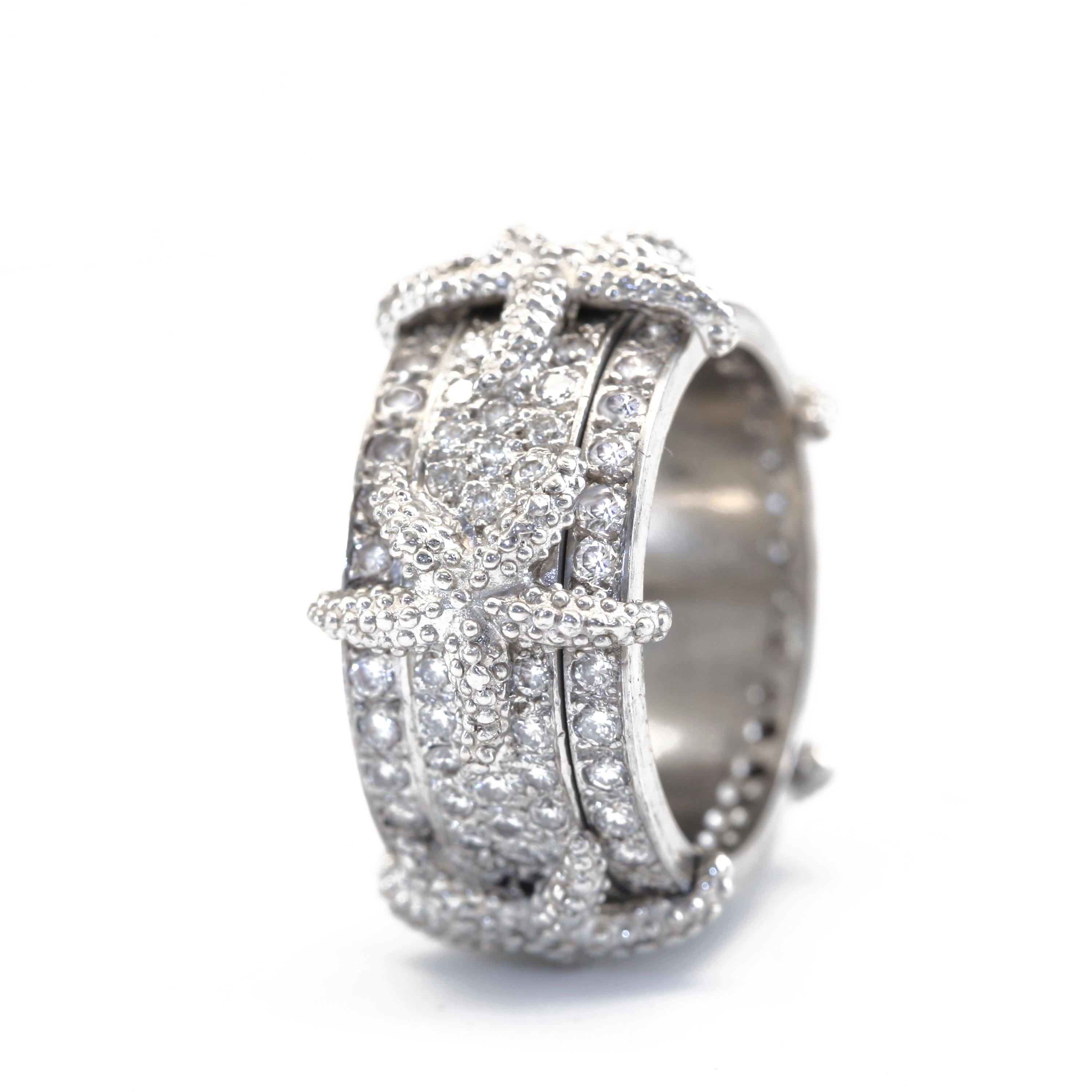 Wide and Narrow Spinning Sea Star Ring with approximately 1.6 carats of G-H color, VS2 Clarity Diamonds. The wide width is 9 mm. This Narrow version is quite often chosen for the wearer who may be a bit more petite. The length of a person's finger