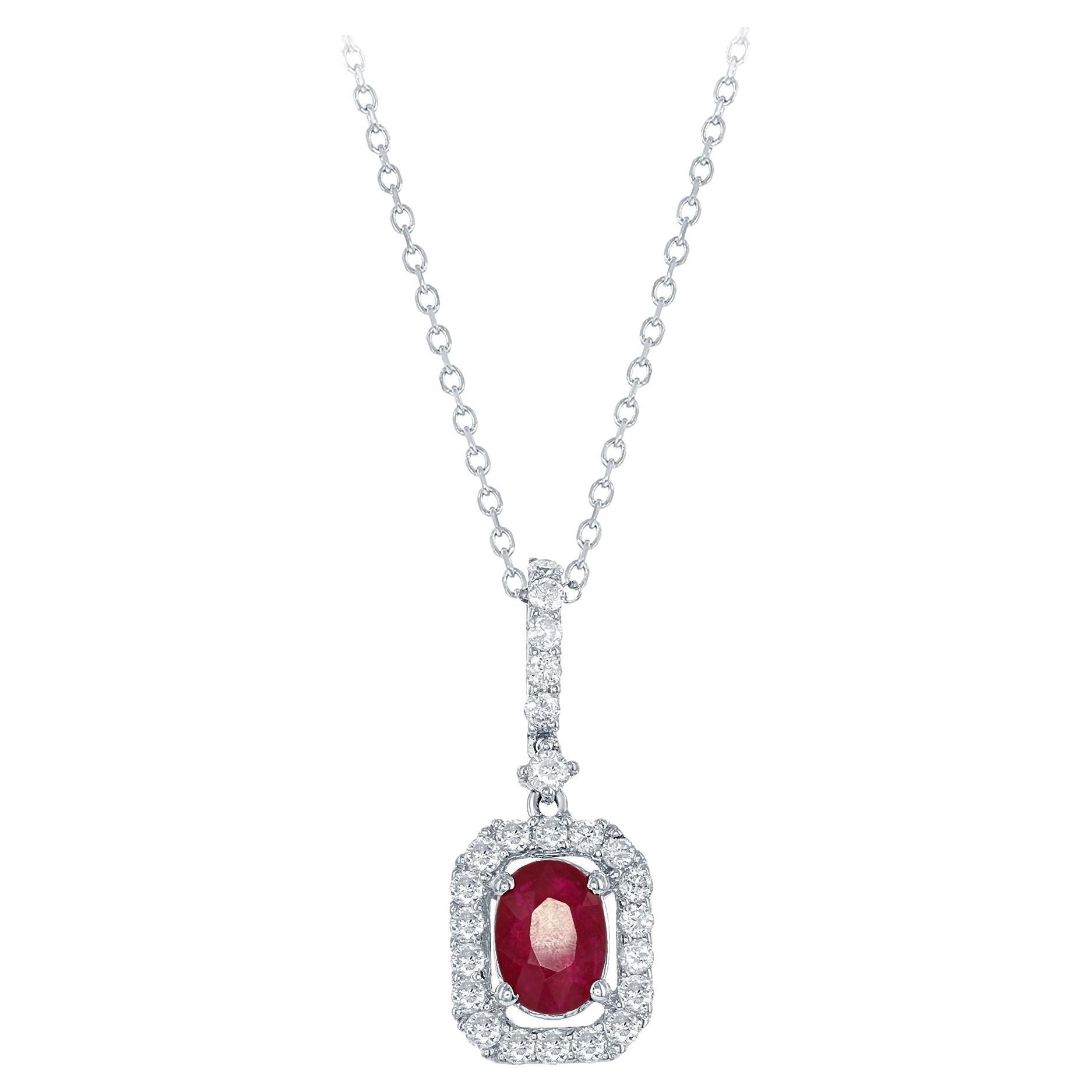 Diana M. 1.00 Carat Oval Cut Ruby and Diamond Halo Pendant For Sale