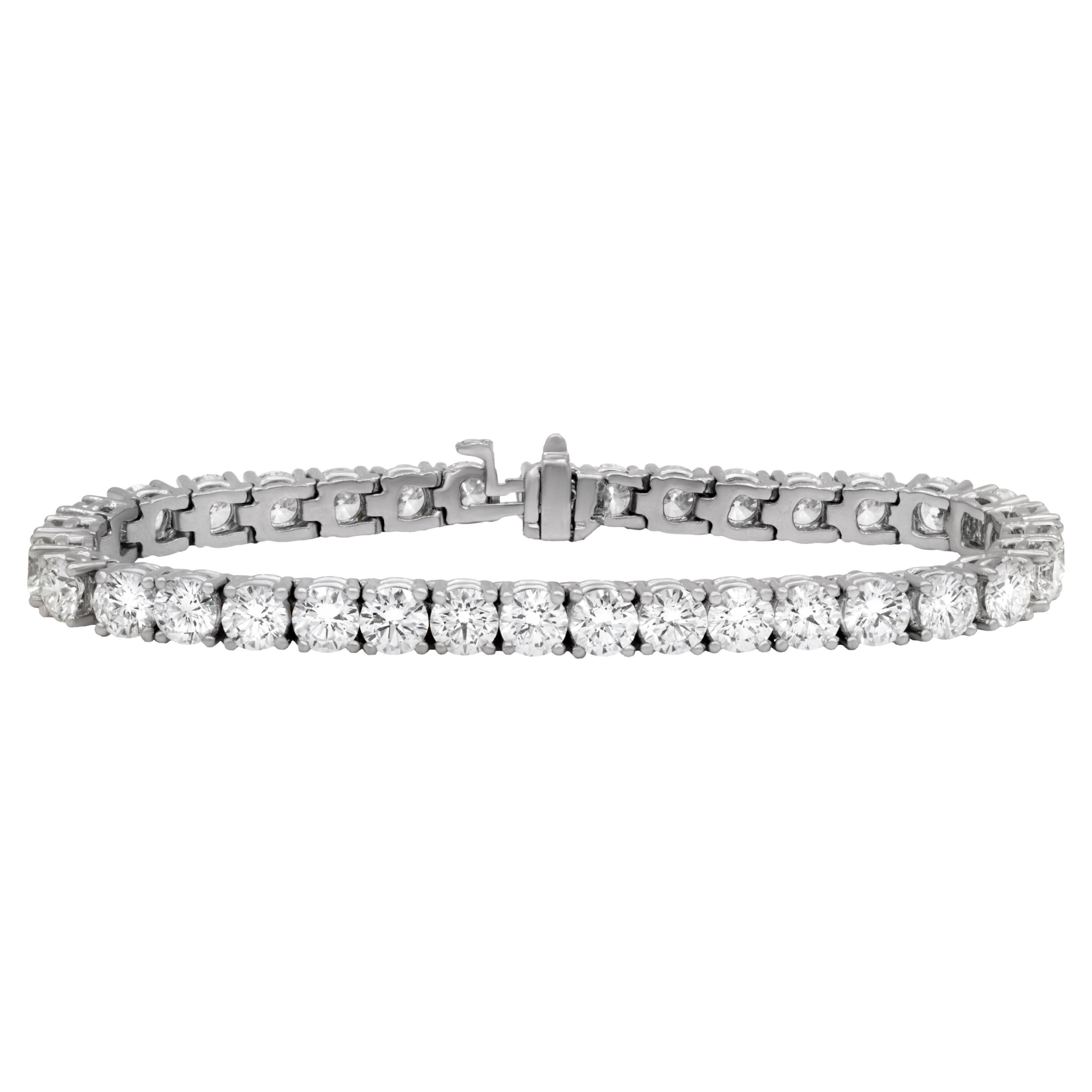 Custom 14-kt white gold diamond tennis bracelet with round cut diamonds weighing 8.00 carats total of 40 stones 0.20 each GH color SI clarity.  Excellent Cut.