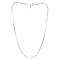 Diana M. 14 kt white gold, 16" 4 prong diamond tennis necklace featuring 8.00 ct
