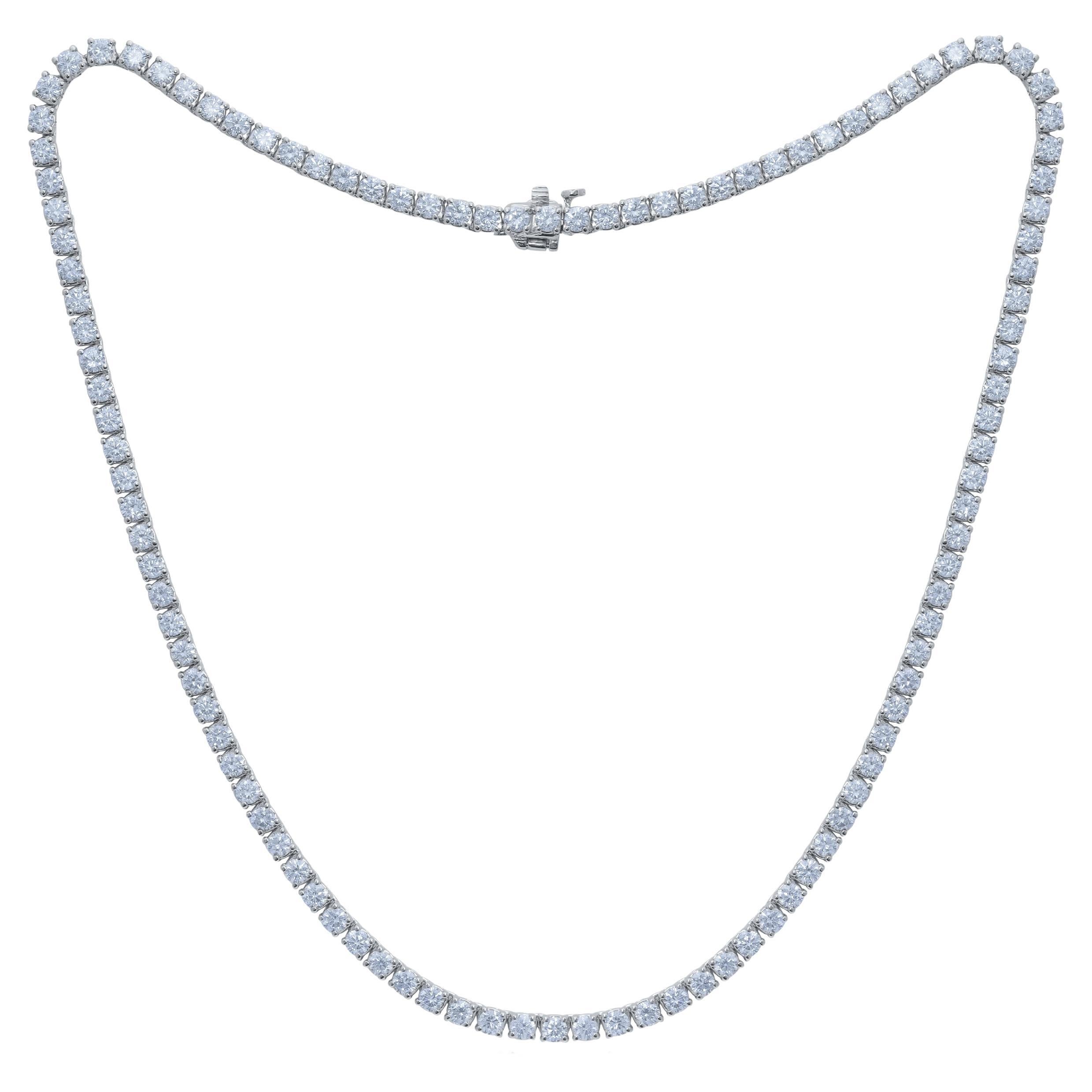 Diana M. 14 kt white gold, 18" 4 prong diamond tennis necklace featuring 10.50  For Sale