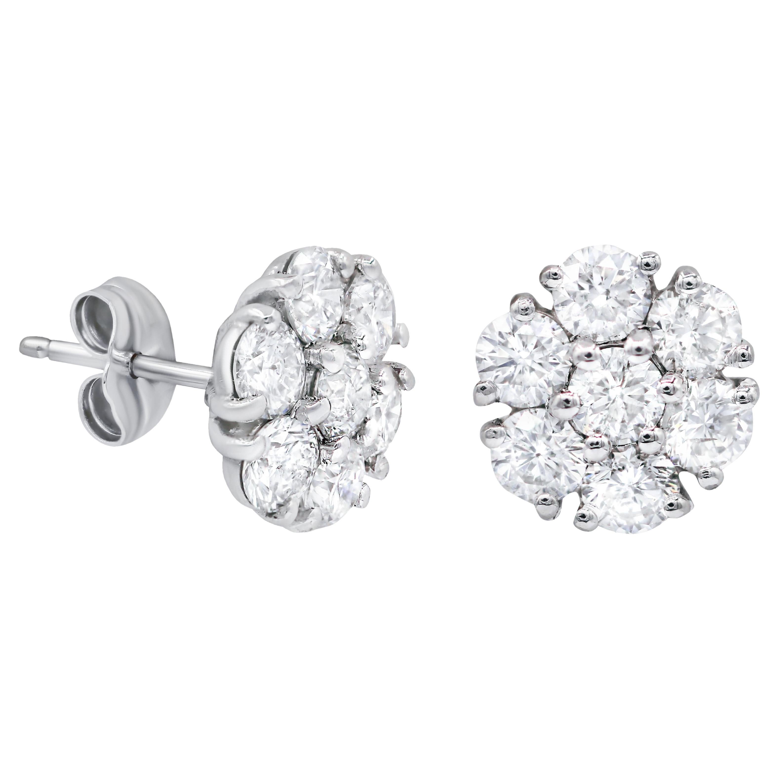 Diana M. 14 kt white gold diamond cluster stud earring adorned with 2.55 cts tw  For Sale