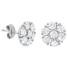Diana M. 14 kt white gold diamond cluster stud earring adorned with 2.55 cts tw 
