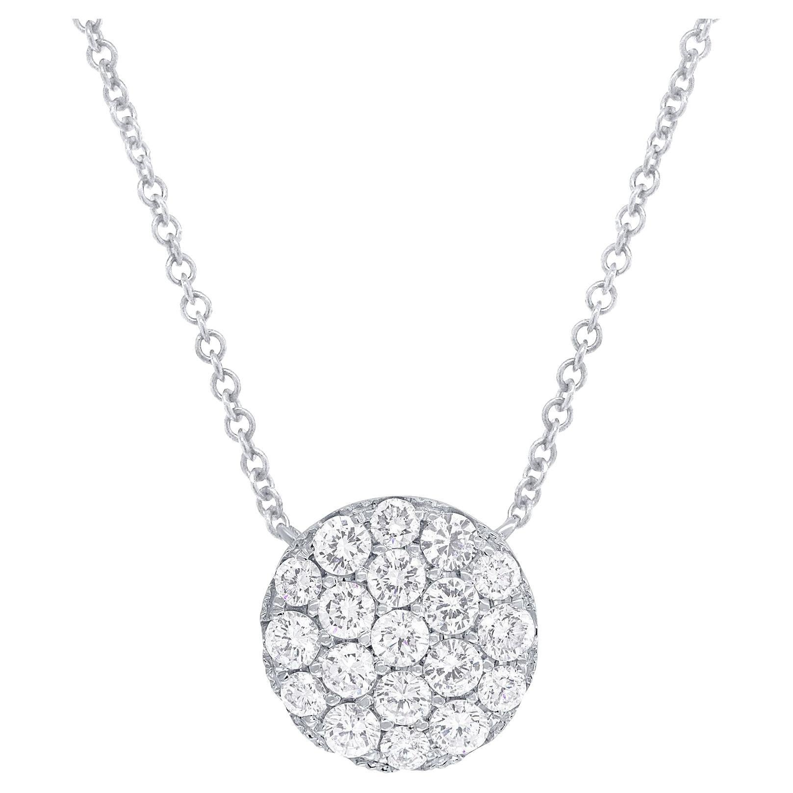 Diana M. 14 kt white gold diamond pendant with pave circle design 