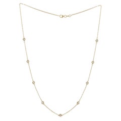 Diana M. 14 kt yellow gold, 18" diamonds-by-the-yard necklace featuring 1.00 cts
