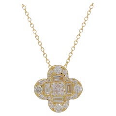 Diana M. 14 kt yellow gold diamond pendant with clover-shaped design 