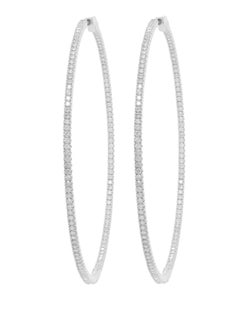 Diana M. 14kt white gold, 1.75" hoop earrings featuring 1.30cts  round diamond