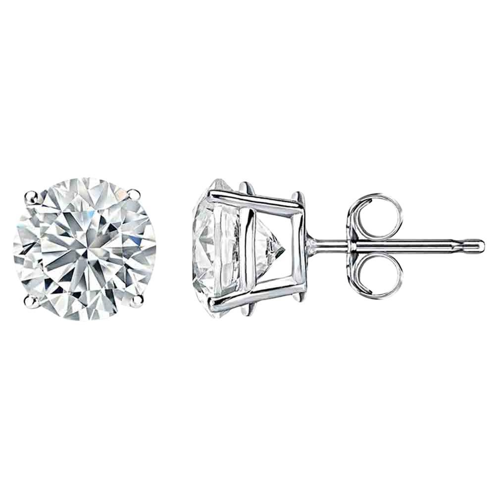 Diana M. 14kt white gold diamond stud earrings containing 2.00 cts tw  For Sale