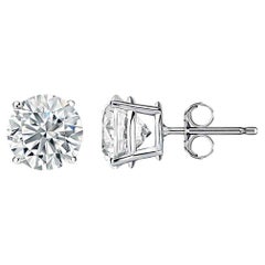 Diana M. 14kt white gold diamond stud earrings containing 2.00 cts tw 