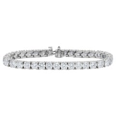 Diana M. 14kt white gold diamond tennis bracelet features 6.00 cts tw 